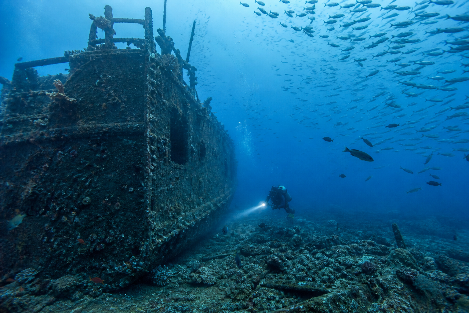 Diver exploring a wreck in clear Mediterranean water off Cyprus